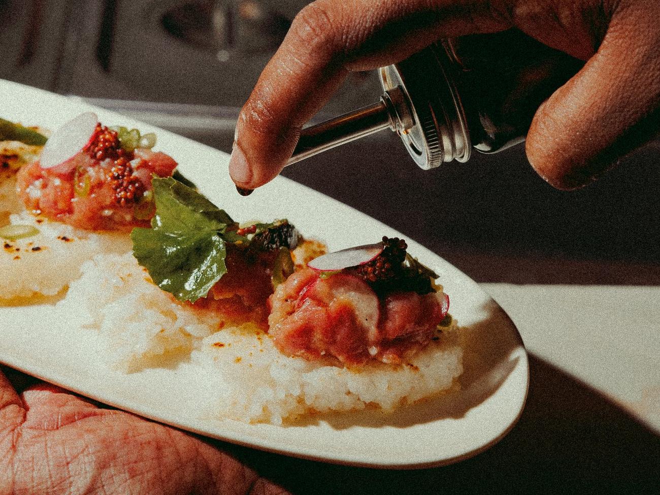 Dressing a dish in the kitchen
